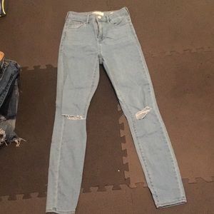super high rise light wash jeans